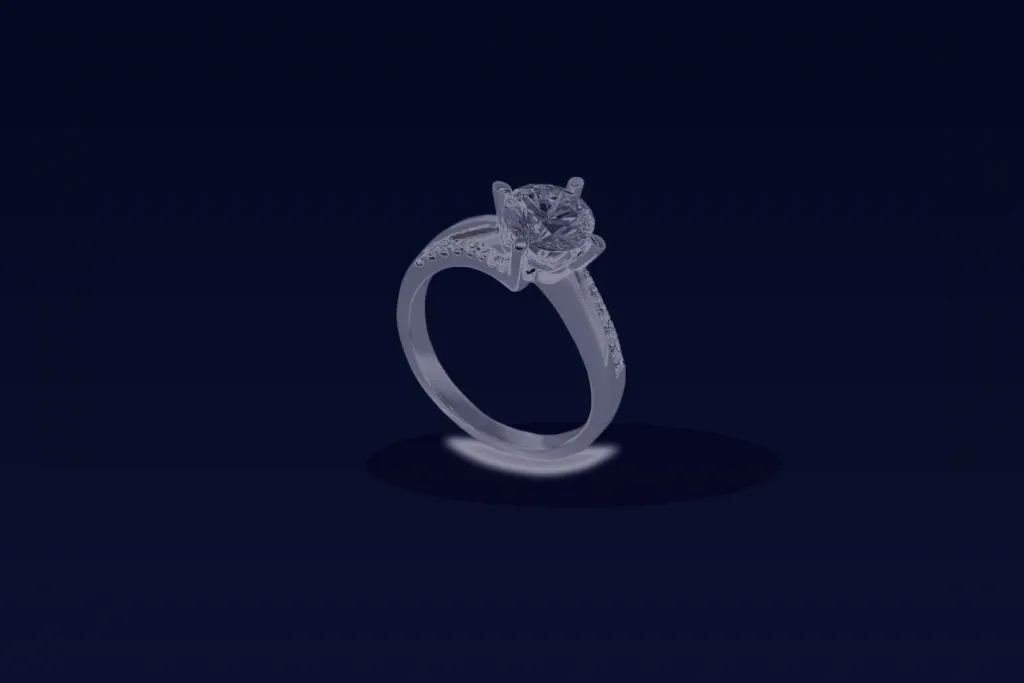 Sterling silver ring on a dark slate surface