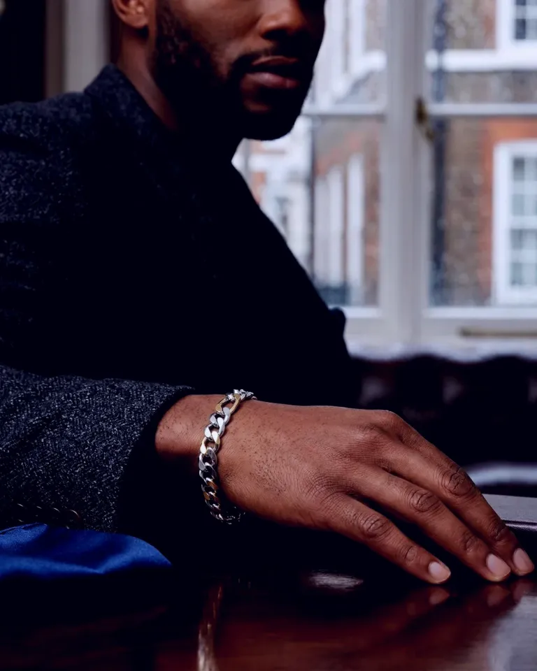 Silversmith hands working at a bench in Birmingham